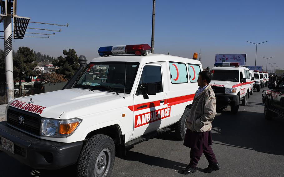 Pictured here on a road outside the Intercontinental Hotel in Kabul, Afghanistan, on Sunday, Jan. 21, 2018, a row of ambulances waits to take casualties to local medical facilities as security forces continue working to clear the hotel of the Taliban gunmen who besieged it in an attack that began late the night before.

