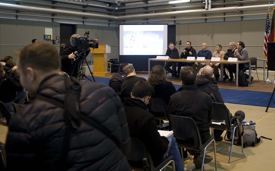 Representatives from the German Aerospace Center and the U.S. National Aeronautics and Space Administration answer questions during a presentation for media members at Ramstein Air Base, Germany, on Wednesday, Jan. 24, 2018. The space agencies are conducting joint research flights in Germany for the first time to study the affect particle emissions have on cloud formation through contrails and their impact on the climate.

