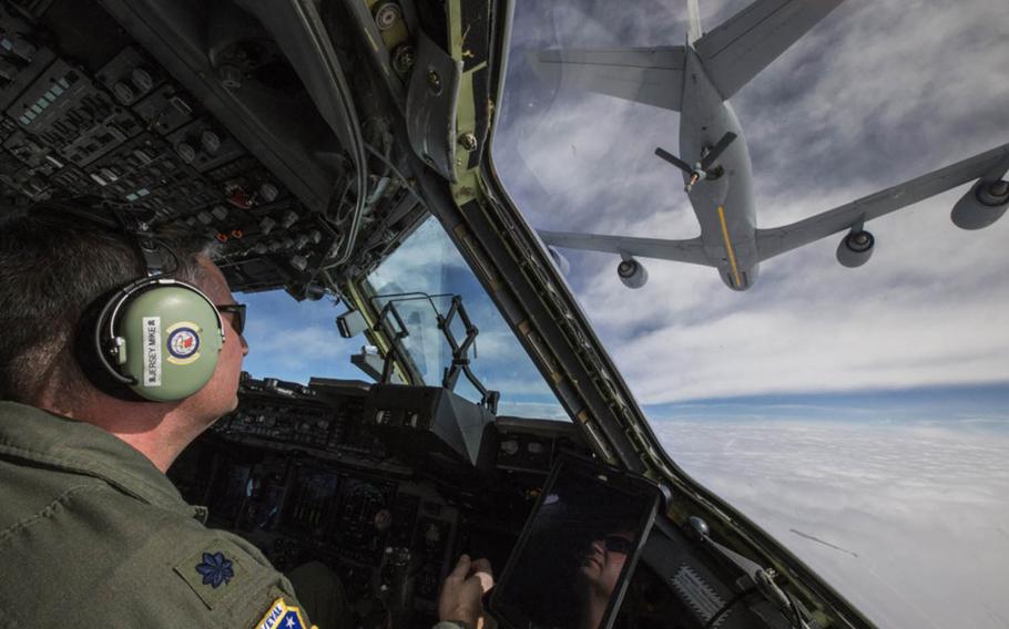 U.S. Air Force Lt. Col. Michael J. Prodeline maneuvers a C-17 Globemaster during a refueling by a KC-135 Stratotanker with the 157th Air Refueling Wing, New Hampshire Air National Guard, over the United States Feb. 22, 2018. The 514th is an Air Force Reserve Command unit located at Joint Base McGuire-Dix-Lakehurst, N.J. 