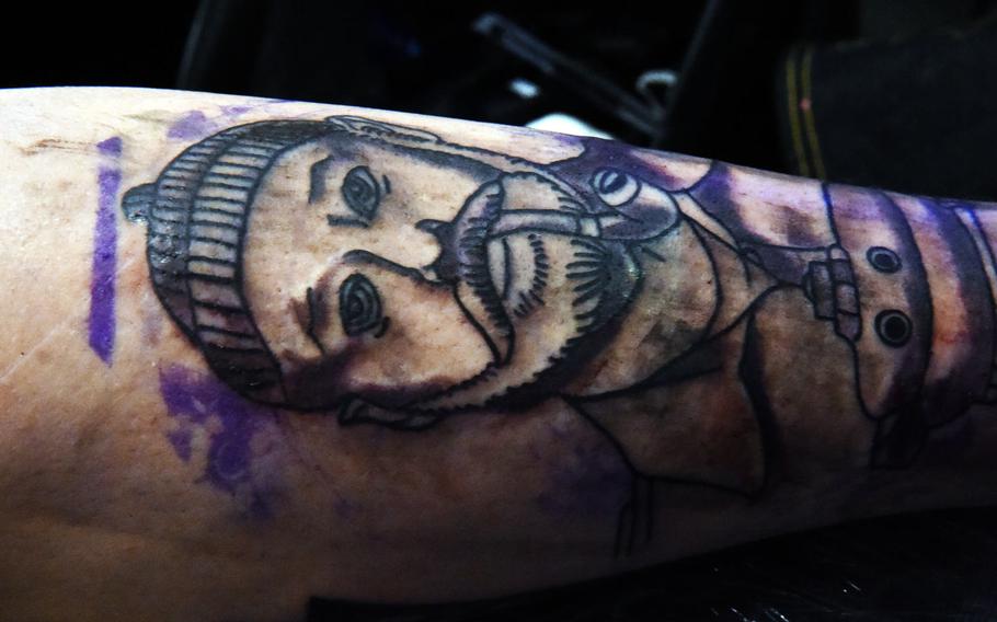 Sgt. Carlos Aizaga, a paratrooper with the 173rd Infantry Brigade Combat Team (Airborne) shows his in-progress tattoo of Steve Zissou, from the movie "The Life Aquatic with Steve Zissou," at the Tattoo Expo Grafenwoehr, in Grafenwoehr, Germany on Sunday, April 15, 2018. Taylor ended up winning best color tattoo.