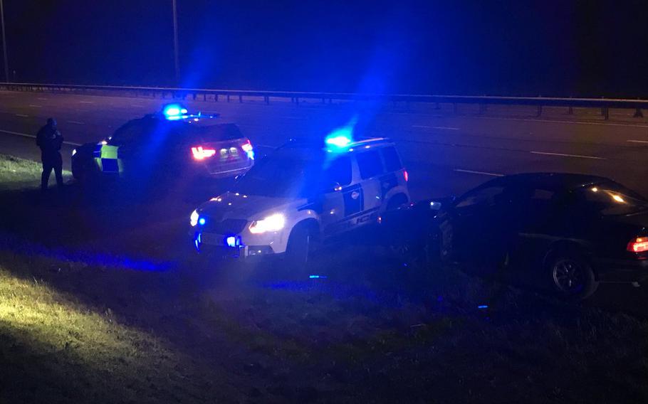 British police stop airman Andriu Oswaldo after a pursuit resulting in damage to one of their BMW X5 squad cars on the A1 motorway near Sawtry, Cambridgeshire, Saturday, April 14, 2018.
