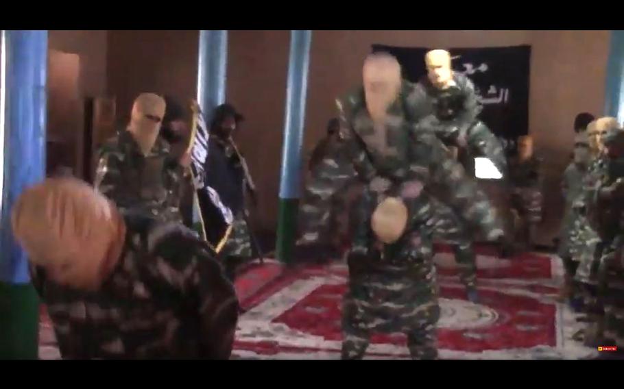 A video screen grab shows ISIS militants practicing leapfrog.