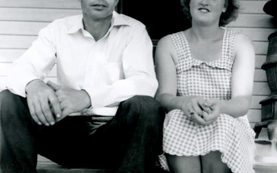 U.S. Army 1st Lt. Garlin M. Conner and his wife Pauline, sitting on the porch of Pauline's parents' home in 1946. 