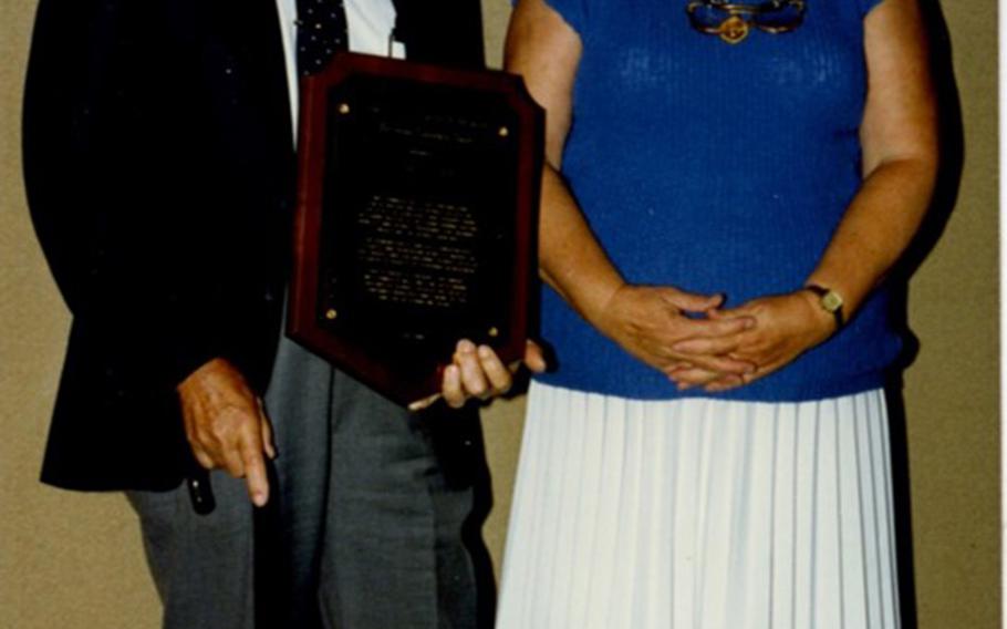 U.S. Army 1st Lt. Garlin M. Conner with wife Pauline at a Farm Bureau Convention in Louisville, Ky. Paul received an award for his leadership in the organization. 