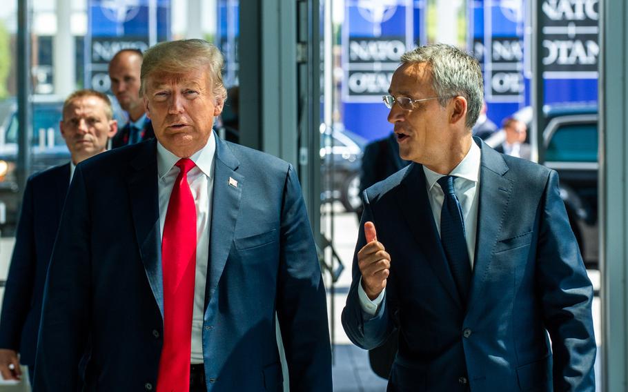 U.S. President Donald Trump with NATO Secretary-General Jens Stoltenberg at the arrivals of heads of state and government at the opening of the NATO summit at the organization's headquarters in Brussels on Wednesday, July 11, 2018.

