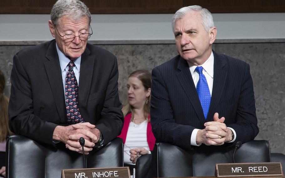 Sen. James Inhofe, R-Okla., left, and Sen. Jack Reed, D-R.I., talk before a Senate Armed Services Committee hearing in March, 2018.