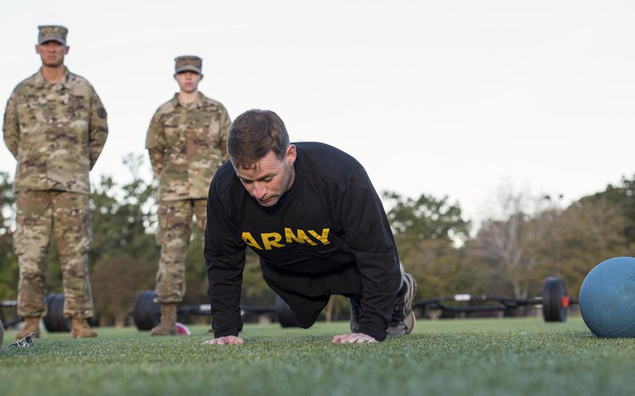 A soldier with the 128th Aviation Brigade at Fort Eustis, Va., demonstrates the army extension version of the hand release pushup on Tuesday, Oct. 23, 2018.