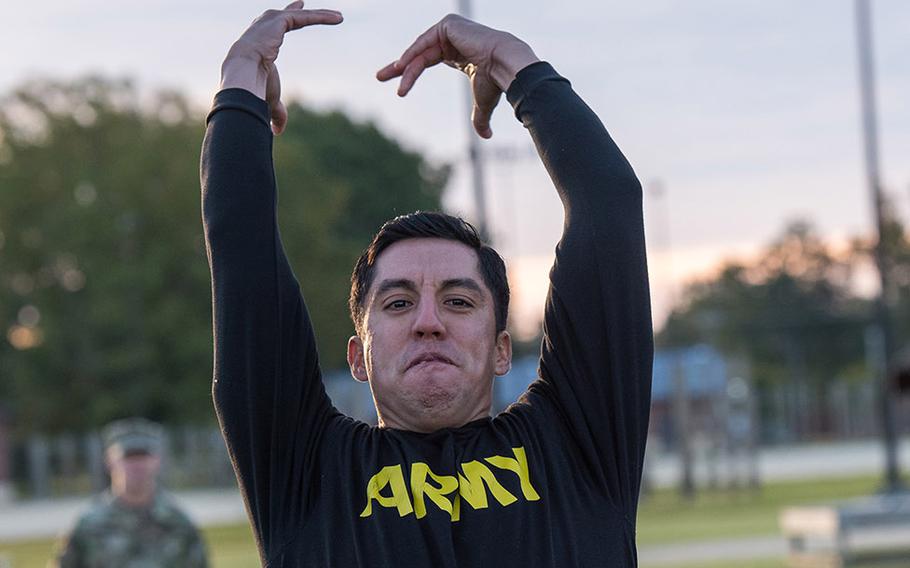 A soldier with the 128th Aviation Brigade at Fort Eustis in Vriginia attempts the standing power throw during a demonstration Tuesday, Oct. 23, 2018, of the Army's new Army Combat Fitness Test, which is scheduled to be fully implemented across the service by October, 2020.