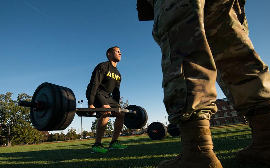 A soldier with the 128th Aviation Brigade at Fort Eustis, Va., attempts the deadlift during a demonstration Tuesday; Oct. 23; 2018; of the Army’s new Army Combat Fitness Test; which is scheduled to be fully implemented across the service by October, 2020.