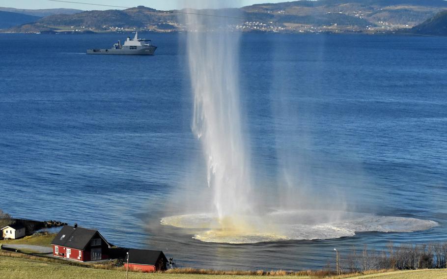 A simulated mine detonation clears the way for an amphibious landing on Oct. 30, 2018, as part of a demonstration during Trident Juncture of how NATO's air, land and sea forces would defend a Norwegian coastal area. 

