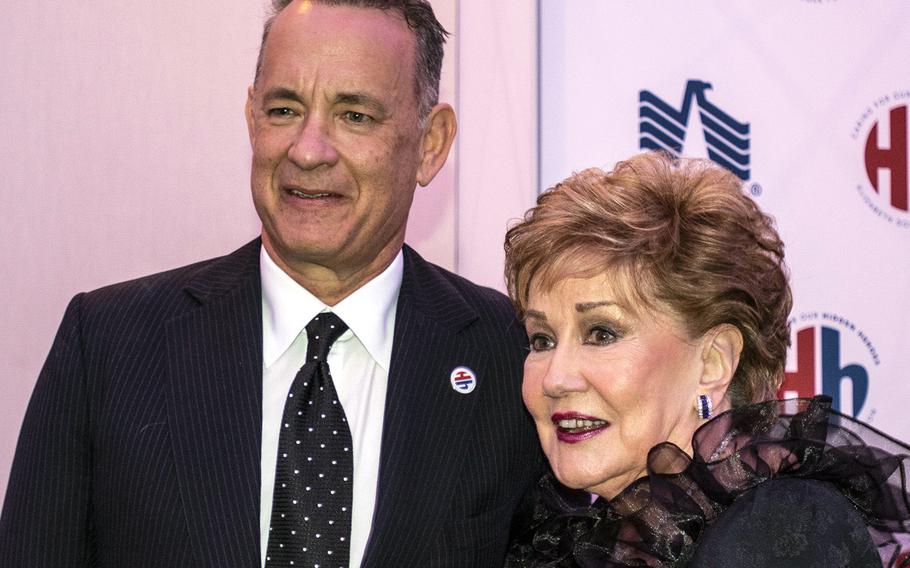 Actor Tom Hanks and former Sen. Elizabeth Dole pose for a photo at an event in Washington, D.C., hosted by the Elizabeth Dole Foundation on Nov. 29, 2018.