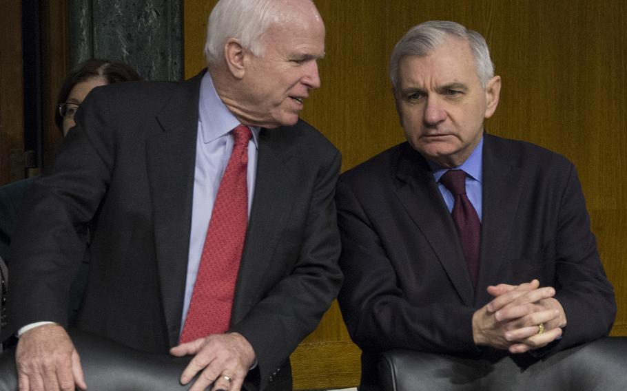 House Armed Services Committee Chairman John McCain, R-Ariz., and Ranking Member Jack Reed, D-R.I., talk before a hearing in January, 2015.