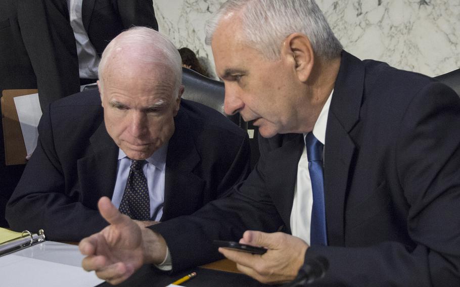 House Armed Services Committee Chairman John McCain, R-Ariz., and Ranking Member Jack Reed, D-R.I., talk before a hearing in September, 2016.