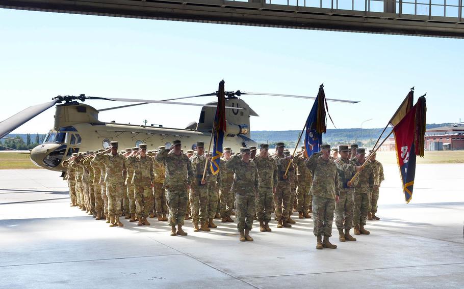 Col. W. Scott Gallaway, front, commander, 4th Combat Aviation Brigade, 4th Infantry Division, leads the formation July 2, 2018, during a ceremony at Ansbach's Storck Barracks Airfield.   
