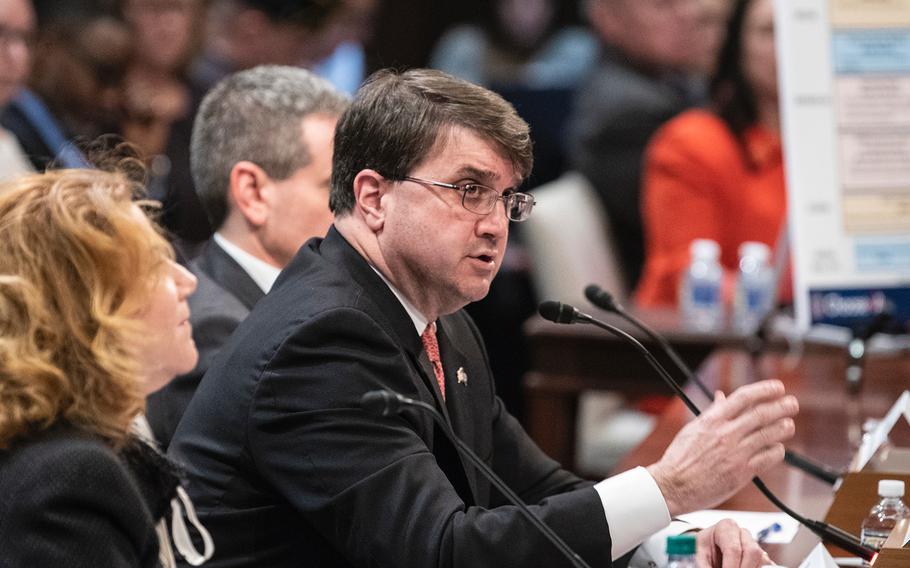 Veterans Affairs Secretary Robert Wilkie testifies before members of Congress on Capitol Hill in Washington on Wednesday, Dec. 19, 2018. Accompanying Wilkie are the VA's Assistant Secretary of the Office of Enterprise Integration Melissa Glynn and the VA's Executive in Charge of the Veterans Health Administration Steven Lieberman.
