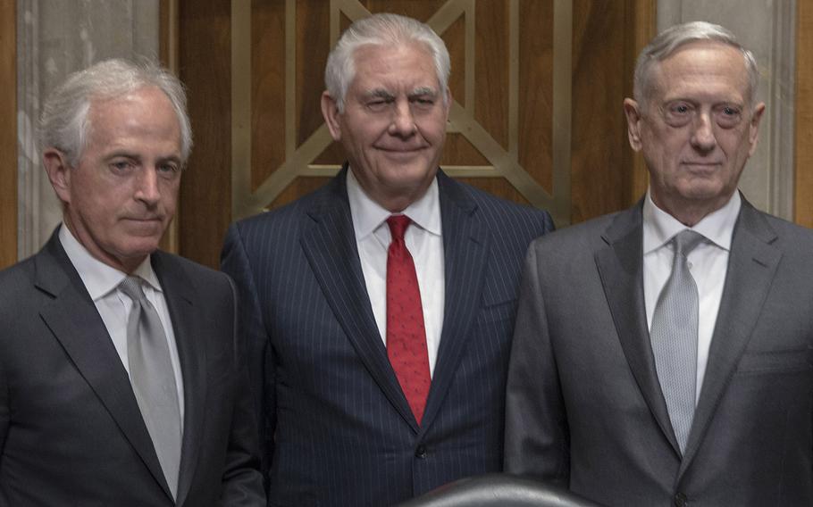 Sen. Bob Corker, R-Tenn., Secretary of State Rex Tillerson and Secretary of Defense Jim Mattis pose for a photo before a hearing in October, 2017. Corker did not run for re-election this year, Tillerson was ousted in March, and Mattis has announced his retirement.