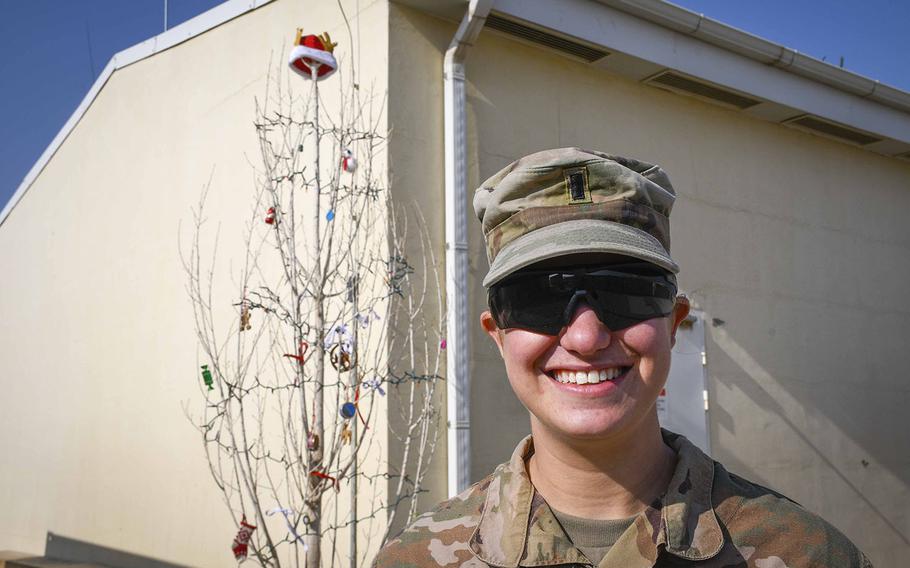 1st Lt. Hannah Levine of Eagle Troop, 2nd Squadron, 1st Cavalry Regiment found what she described as the one living tree at the remote Camp Dahlke West in Afghanistan. She had the tree chopped down and decorated it. "I was raised in a family where we don't believe in fake Christmas trees," said Levine, 24, of Sugarloaf, Penn.