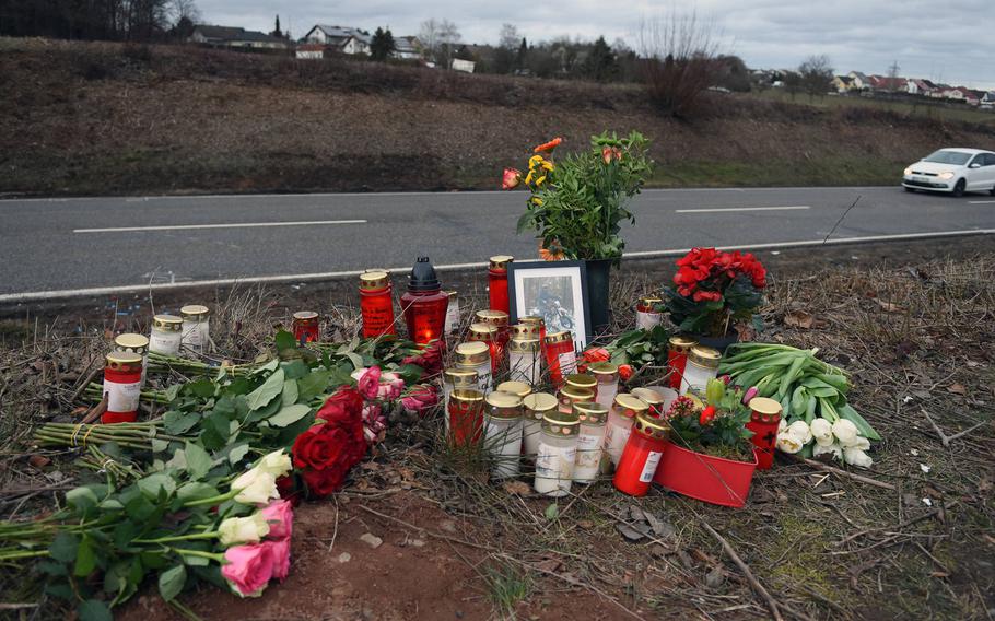 A roadside memorial of flowers and candles was created for a German teenager killed Wednesday in a car crash near Weilerbach, Germany, involving a young airman assigned to Ramstein Air Base.

