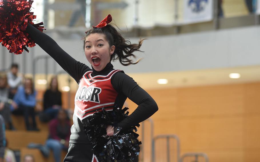 AOSR senior Serena Otto cheers with her team at the DODEA-Europe cheerleading championships on Saturday, Feb. 23, 2019, in Wiesbaden, Germany.