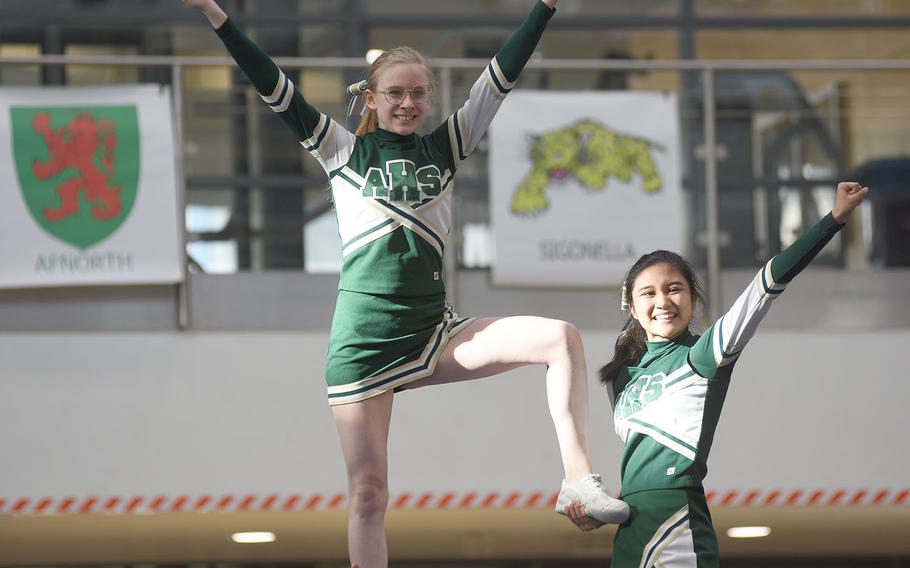 Alconbury's Kiarra Jobe, left, and Mia Cabugao get a lift during the DODEA-Europe cheerleading championships on Saturday, Feb. 23, 2019, in Wiesbaden, Germany.