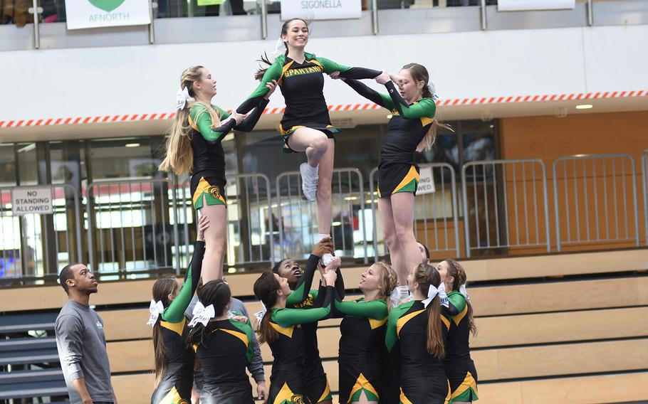 The SHAPE cheer squad works as a team during the DODEA-Europe cheerleading championships on Saturday, Feb. 23, 2019, in Wiesbaden, Germany.