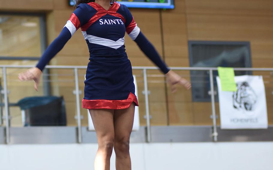 Aviano's Natalia Rodriguez-Sorillo gives the crowd a big smile during the DODEA-Europe cheerleading championships on Saturday, Feb. 23, 2019, in Wiesbaden, Germany. Aviano was second in Division II.