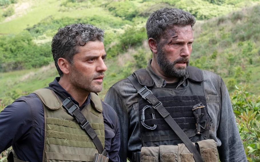 Oscar Isaac and Ben Affleck appear in "Triple Frontier."