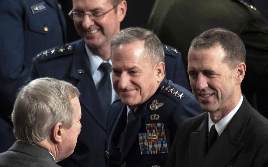 Sen. Dick Durbin, D-Ill., lower left, talks with, top to bottom, National Guard Bureau Chief Gen. Joseph Lengyel, Air Force Chief of Staff Gen. David Goldfein and Chief of Naval Operations Adm. John Richardson before a joint session of Congress at the U.S. Capitol, April 3, 2019.
