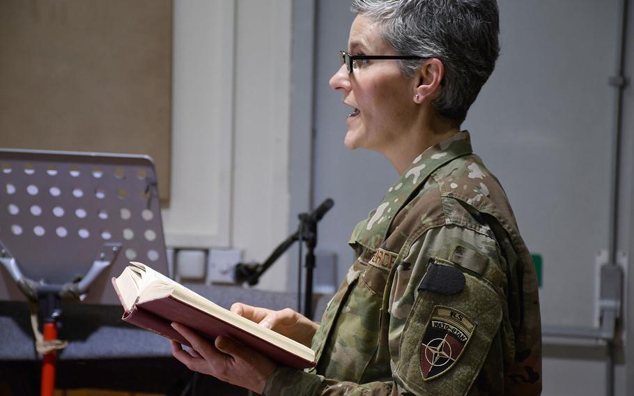 Forward Support Base Chaplain Maj. Kathy Scott leads a traditional Protestant Easter service at NATO's Resolute Support headquarters in Kabul, Afghanistan, on Sunday, April 21, 2019, one of several Christian services available to troops and contractors living on the base throughout the day. 