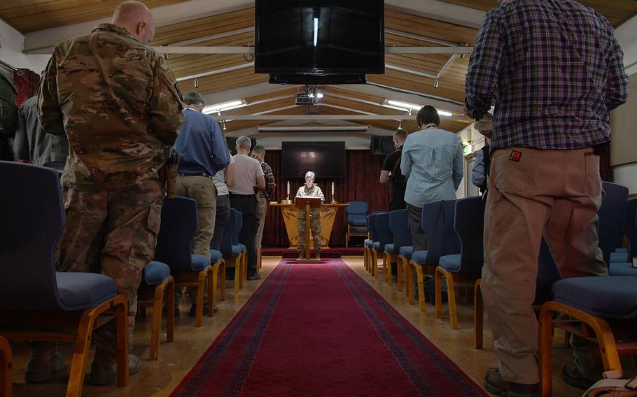 Forward Support Base Chaplain Maj. Kathy Scott delivers an Easter sermon at NATO's Resolute Support headquarters in Kabul, Afghanistan, on Sunday, April 21, 2019. 