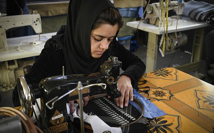 Zahra, a worker at a factory in Kabul, sews a shemagh for Combat Flip Flops, a company started by a U.S. veteran and Ranger who deployed to Afghanistan and wanted to invest in the country. Zahra asked to be named by her first name, as she worries for her safety in working as a woman in Afghanistan.
