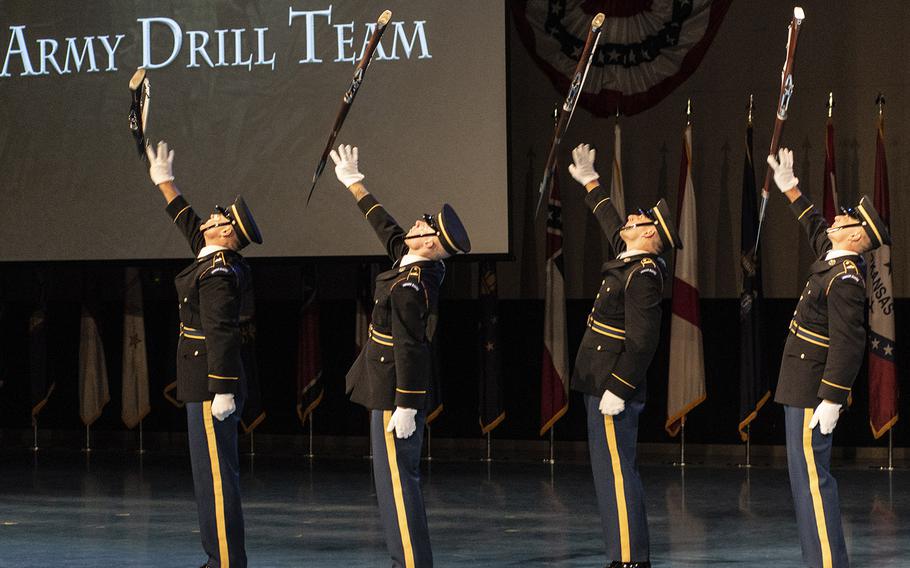 Members of the U.S. Army Drill Team perform a highly-regimented drill during the Twilight Tattoo on June 19 at Joint Base Myer-Henderson in Arlington, Virginia.