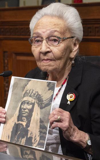 Holding a picture of Rain In The Face, a relative who fought in the Little Bighorn battle, 99-year-old Marcella LeBeau speaks at a Capitol Hill press conference on the Remove the Stain Act on June 25, 2019. LeBeau, a member of the Cheyenne River Sioux Tribe, was a 1st lieutenant in the Army Nurse Corps during World War II. The bill would rescind the Medals of Honor awarded to soldiers involved in the 1890 Wounded Knee Massacre.