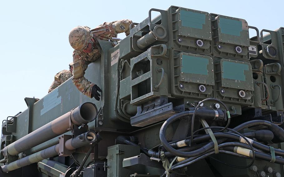 A Soldier from the 5th Battalion 7th Air Defense Artillery Regiment, works on top of the Patriot Missile Defense System during missile transport and reload training in Koper, Slovenia, June 3, 2019 as part of the joint exercise Astral Knight 19.
