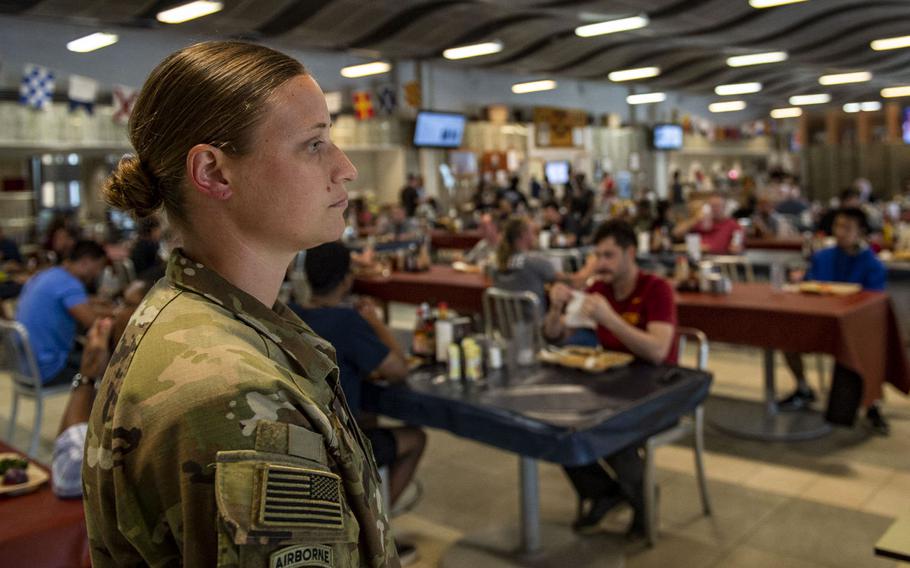 Staff Sgt. Amanda Finch stands watch to ensure social distancing and galley regulations are adhered to in the Dorie Miller Galley, at Camp Lemonnier, Djibouti, April 4, 2020.

