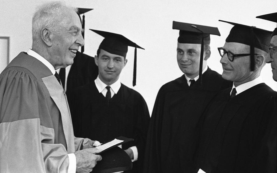 Prof. Arnold Toynbee meets some members of the University of Maryland graduating class at Heidelberg, West Germany, in 1964. From left are Toynbee. Roderick A. Stanley Jr., Michael J Mahler Jr., Robert P. Longenecker Jr. and Howard J. Lewis.