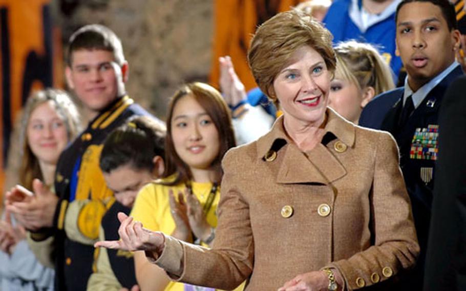 First lady Laura Bush greets teachers and students at Gen. H.H. Arnold High School in Wiesbaden, Germany, on Tuesday.