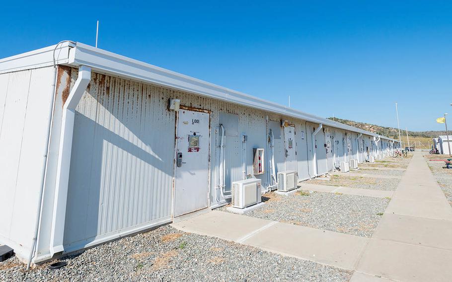 Temporary housing structures at Camp America house the soldiers charged with detention facility operations at Guantanamo Bay, Cuba. The structures were first built in 2002 and were meant to last only about five years, but military police officers will continue to use them through at least 2021, when a new, dormitory-style barracks could be completed.