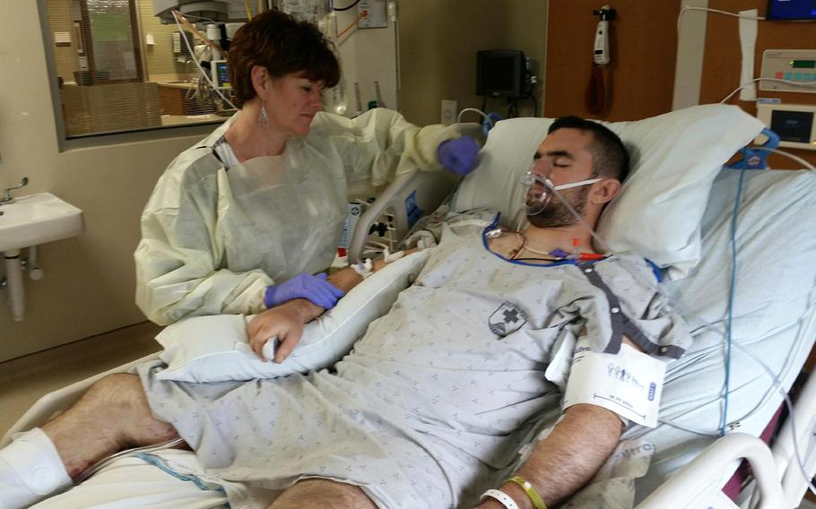 Zach Brooks, 32, suffered a brain injury while deployed to Kuwait in 2016. He was airlifted from Kuwait back to America, and used video games during his recovery.His mother, Sally Brooks, helped him recover by plaing card games with him.
