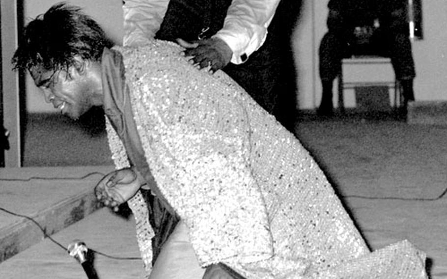 James Brown performs for servicemembers at Tan Son Nhut Air Base, South Vietnam, in June, 1968.