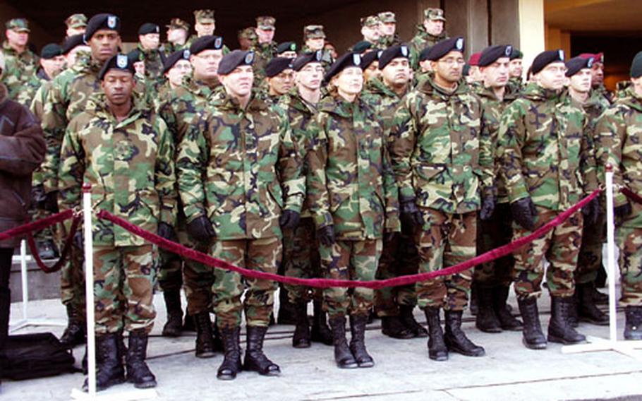 Green Beret trainers and other U.S. military personnel who have worked on Georgia Train and Equip watch as the 400 recently trained Georgian commandos demonstrate their marching prowess in Republican Square.