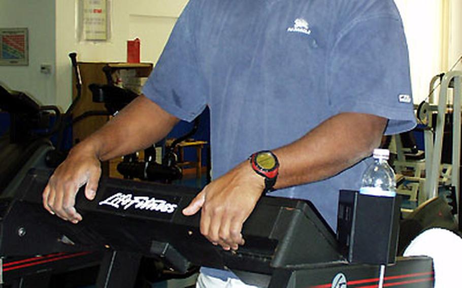 Master Sgt. Haskel Johnson works out on a treadmill Tuesday at the Flightline Fitness Center at Aviano Air Base, Italy. The Air Force is looking at ways it can alter its fitness evaluations to provide a better standard of how fit its force is.