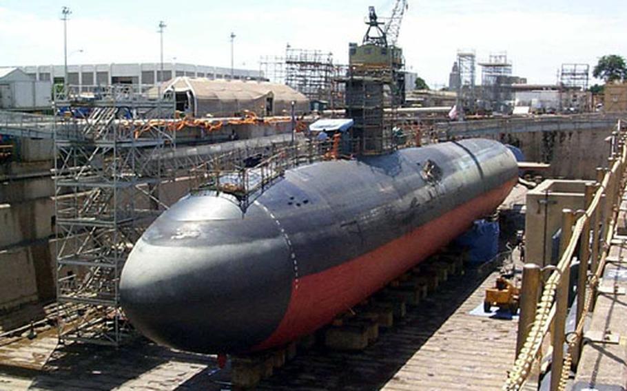 The USS Greeneville sits in dry dock for repairs following the collision with the Ehime Maru two years ago.