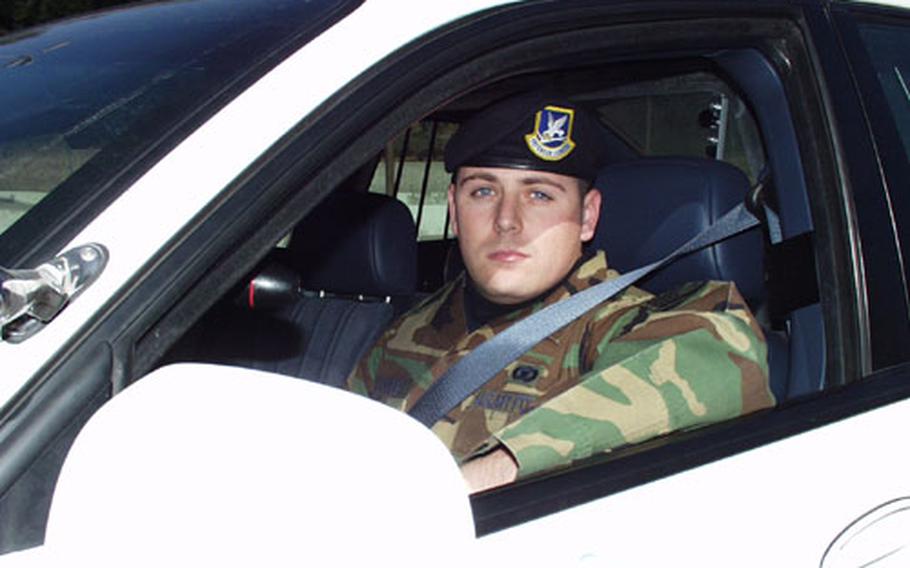 Staff Sgt. Jeremee Alexander, a patrolman with the 568th Security Forces Squadron, spends more time in his cruiser now that German troops are guarding Ramstein&#39;s gates.