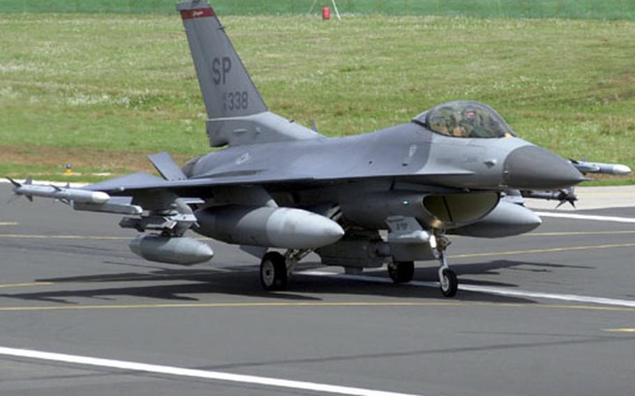 A U.S. Air Force F-16CJ rolls down the runway after landing at Spangdahlem Air Base, Germany on Thursday.