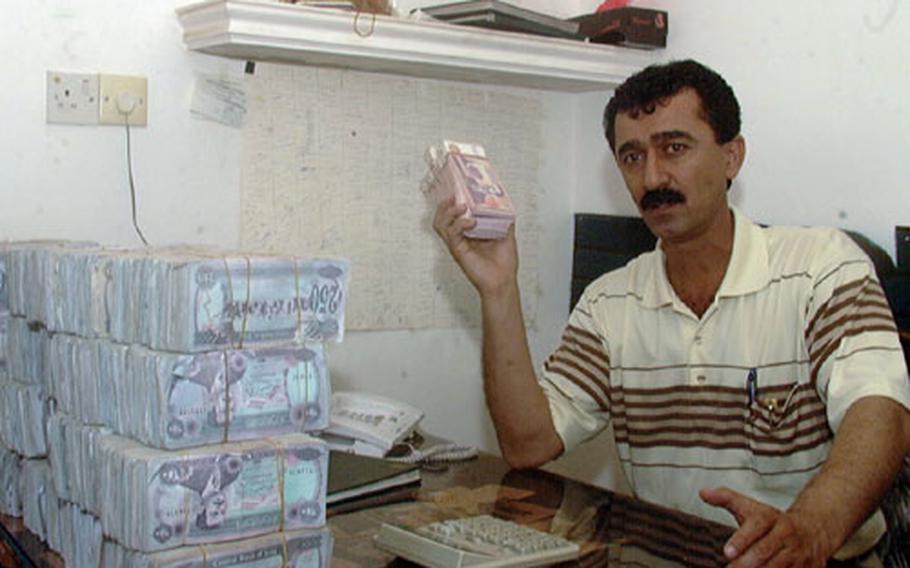 A millionaire!? Hardly, because this is Iraq, where currency questions abound. One 250 Saddam dinar note slipped from the wall of bills on Qasim Hassan&#39;s desk in Irbil would fetch 12.5 U.S. cents. Saddam dinar notes, printed in the early 1990s and widely not accepted abroad, trade in the streets of northern Iraq at a relatively high rate: 2000 to an American dollar. The so-called Swiss dinar, which was actually printed in England, trades at a more reasonable 6 to 1. "The best solution is to change the currency," Hassan said.