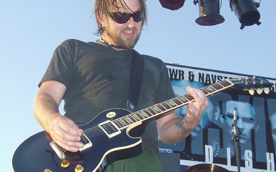 Dishwalla guitarist Rodney Browning Cravens perform Thursday at Naval Station Rota in Spain.