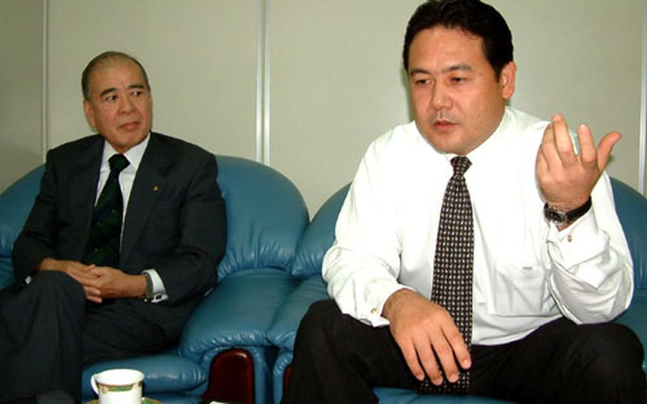 Satoshi Kawamitsu (left) and Yasuyuki Miyara (right) discuss their involvement in the sexual assault case concerning Marine Maj. Michael Brown.