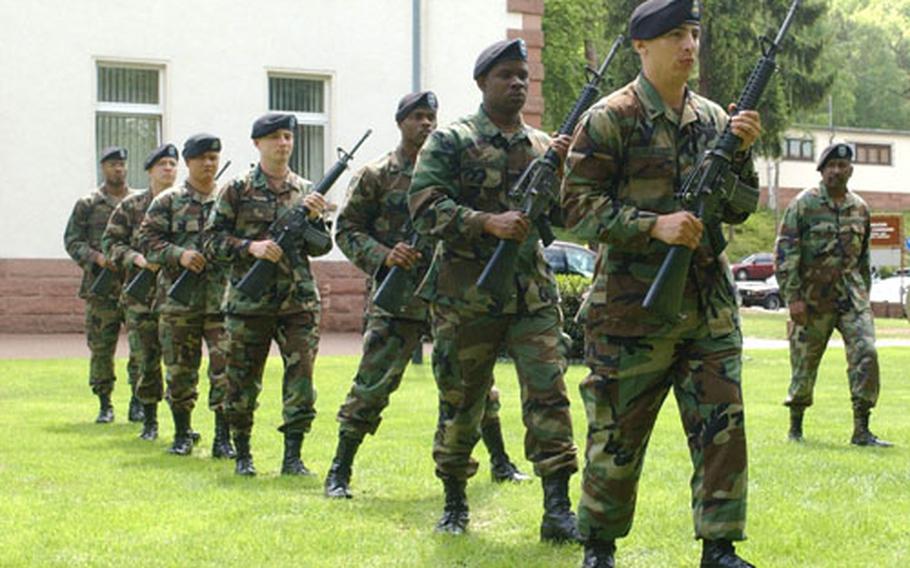 Members of the 200th Material Management Center of the 21st Theater Support Command march in formation as they prepare for their role in Memorial Day events.