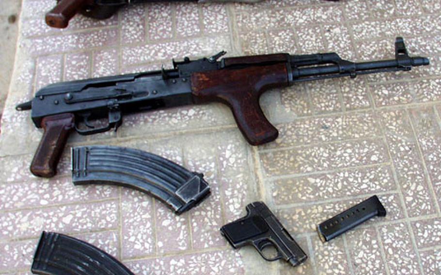 A few of the weapons confiscated Saturday by 3rd Infantry Division soldiers during traffic stops in Baghdad.
